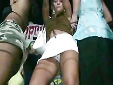 Several hotties dancing in an upskirt (fake) club pornography video