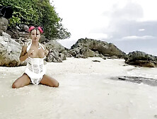 Swims in Sea and Fucks Pussy with a Big Dildo on a White Sand Beach