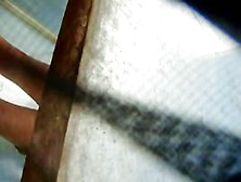 Spying sexy hairy cunt of girl in beach changing cabin