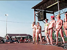 Girls dance and strip at biker rally