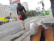 Brunette chick in the hot outdoor upskirt (fake) scene
