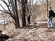 A charming German teenie pleasing a cougar schlong in the woods