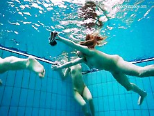 Three teen friends strip in the swimming pool