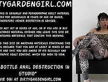 Wine bottle anal destruction in studio Dirtygardengirl