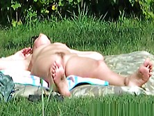 Sunbathing in meadow