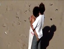 MOM AND SON AT THE BEACH