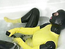 Girl In Yellow Spandex Uniform Has Orgasm In Bathroom