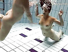 Naked girls swim underwater and look sexy
