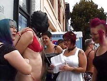 Four Dommes Publicly Humiliate Naked male slave