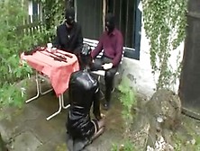 dominant and two slaves play out doors... BMW