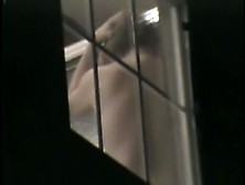 Naked amateur back through the window on cam