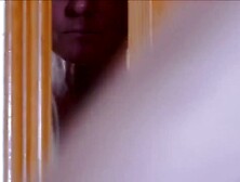 Laid on the daybed,  i kneel over the chap,  pouring body oil over him and massaging his back