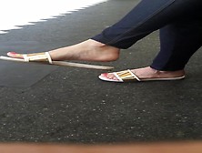 Sexy Feet At London Tube Station,  Red Toes Dangling Feet