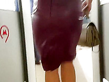 Hot Girl In Burgundy Leather Skirt