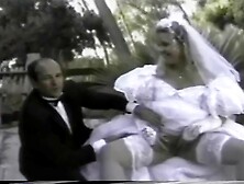 girl wearing a white wedding dress and stockings gets fucked facial