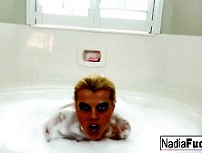 Large titty Nadia White masturbates in the bathroom