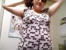 Cute and obese darksome brown angel stripteases in her bedroom