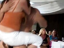 Asian babe takes turns riding strippers cock with redhead