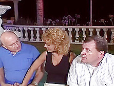 Blonde Manages To Suck Two Cocks At The Same Time