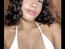 Innocent girl with a tender face masturbates her pussy in a miniskirt