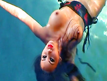 Asian pornstar is playing with some rubber toys