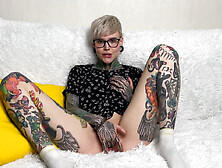 Tattooed student fingering her pussy to shaking orgasm