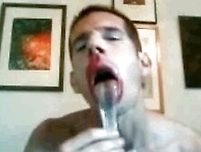 Faggot feeding on a condom full of stinky old cum