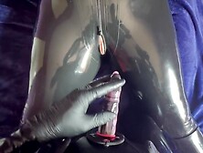 Latex catsuit,  strap-on dong sex.