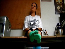 Handsome male foot slave licking his mistress's feet while she texting her lover