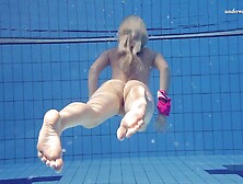 Shaved blonde teen showing horny pussy