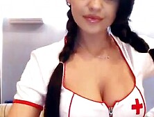 Cute Brunette Girl In Nurse Uniform