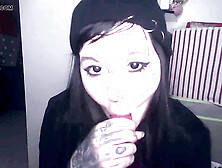 Emo girl Messalinahorror gives a messy solo blowjob with a realistic dildo