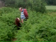 Busty wife jerks off a stranger in a field