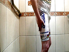 Jerking Under Bathroom In White Bicycle Clothing