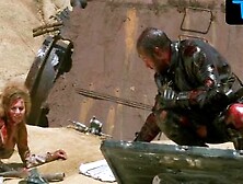 Frederique Feder Breasts Scene in Mutant Action