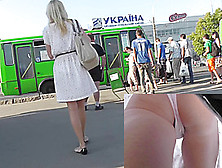 Blonde-haired girl with slender forms in upskirts (fake) video