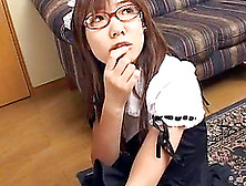 Japanese babe in glasses gives a sexy blowjob