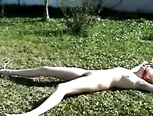 My Blonde Slut Lying Tied Up On The Lawn