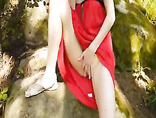 Naughty teen Beata playing with her pussy in forest