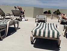 Hidden cam - MILF tanning naked on the terrace