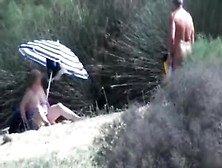 Pervert granny masturbates in front of stranger at beach