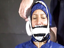 Watch Sandra Beeing Bound,  Pantygagged And Finally Pantyhooded In Her Shiny Nylon Rainwear