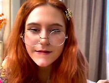 A vocal teacher and a ginger gal in rainbow socks with glasses - POV