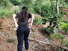 A cute slim Latina girl walks outdoors and flashes her big boobs and ass