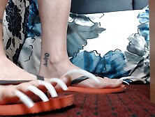 Very Long Toenails in Flipflops