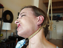 Solo masturbation scene showing a choking solo slut