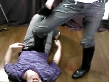 ridingbooted girl kicks her slave