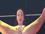 Doll Fucks With Dildo On Stage