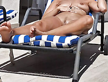 Close-Up Of The Pussy And Tits Of The Sunbathing Stepdaughter