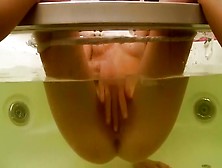 Solo video with my redhead GF fingering her pussy in a jacuzzi